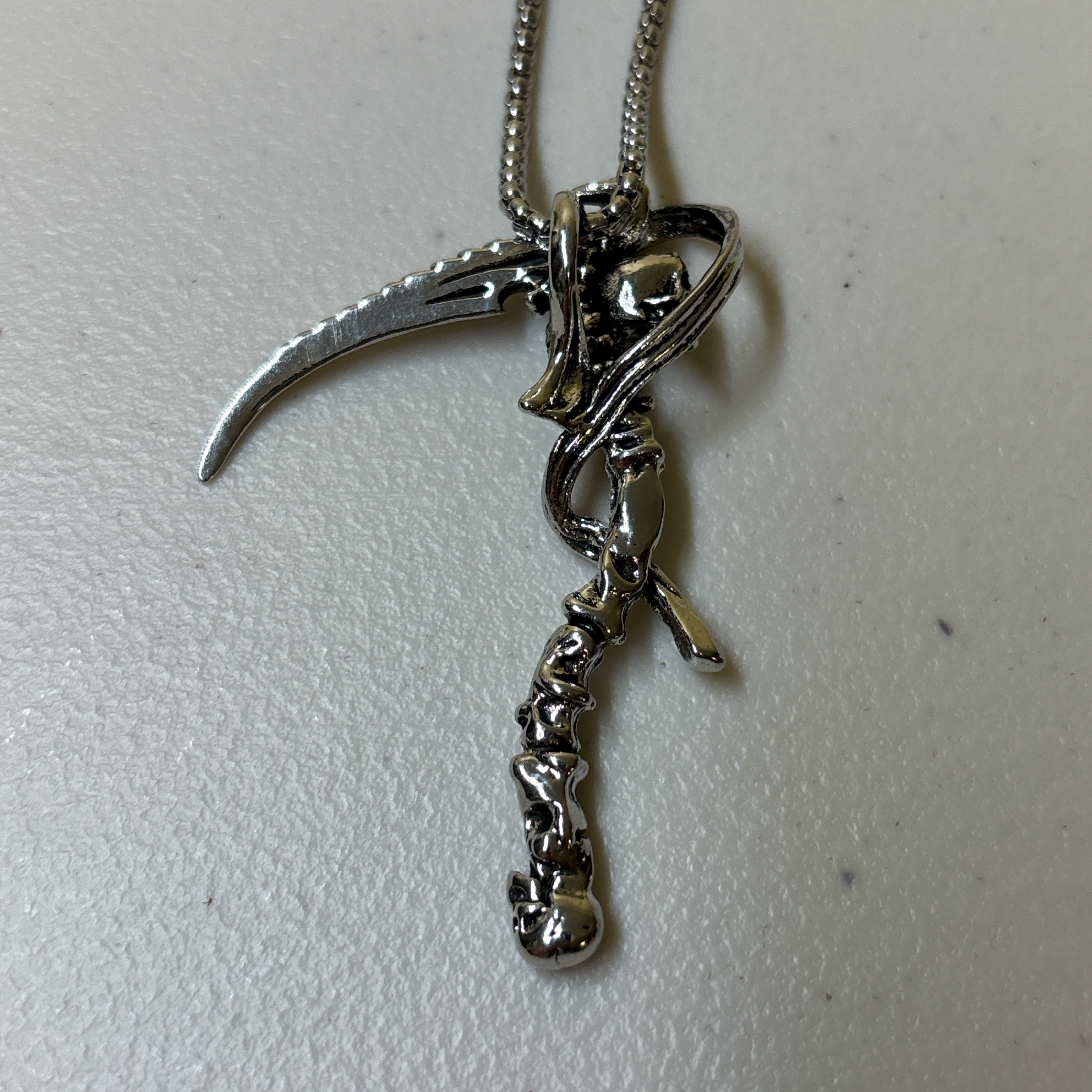 0216 - Skeleton Scythe Necklace
