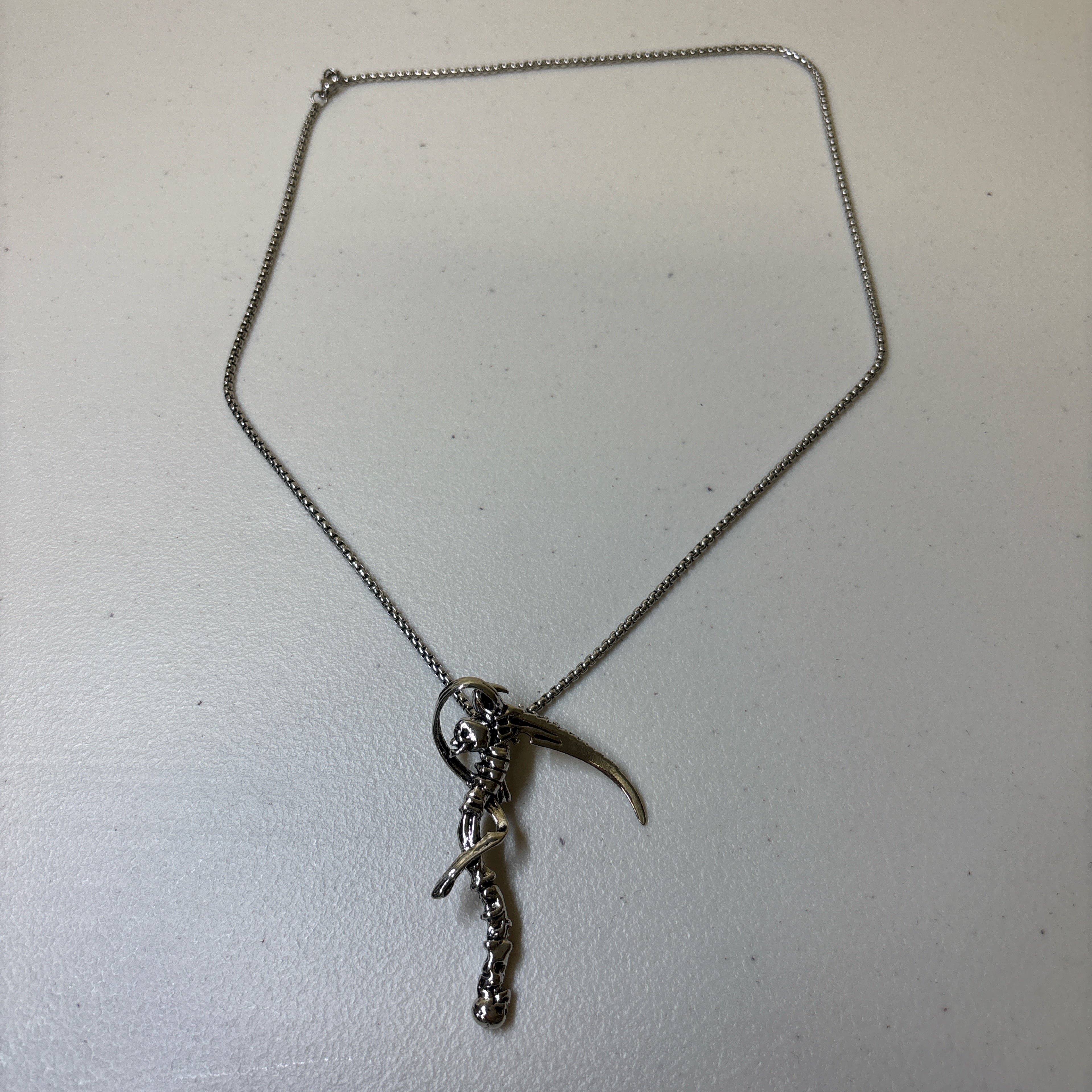 0216 - Skeleton Scythe Necklace